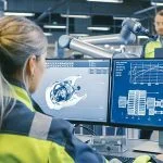 mechanical engineer working on a laptop. concept of best diploma courses after 10th, mechanical engineer diploma courses after class 10
